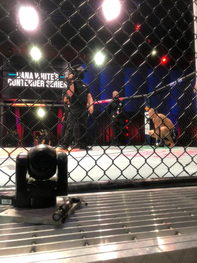 Jansey Silva throws a flying knee inside the Dana White&rsquo;s Contender Series cage.