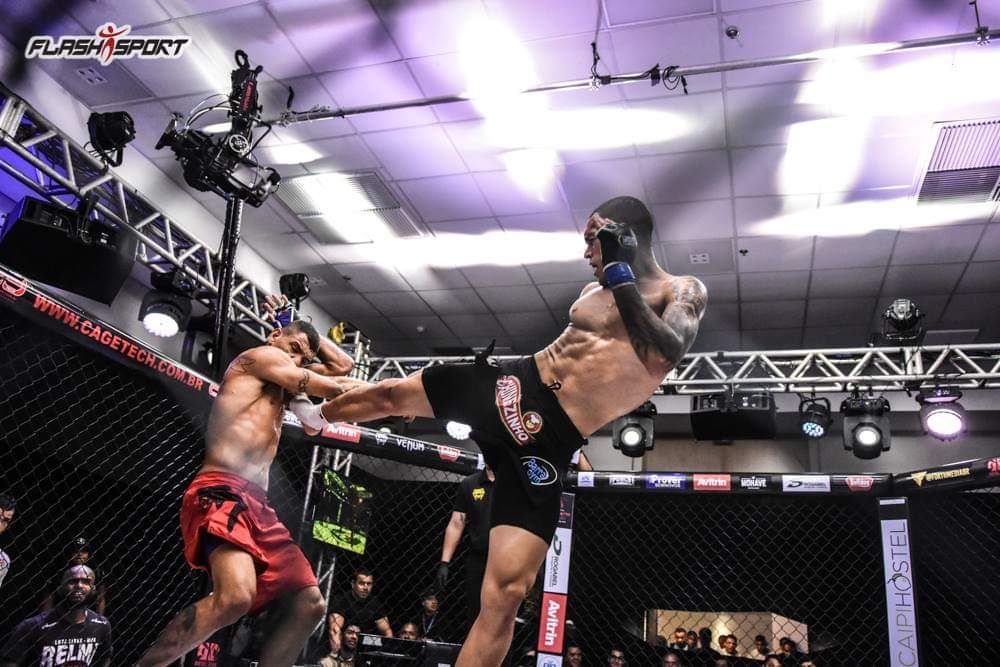 Jansey Silva throws a high kick in the ring.