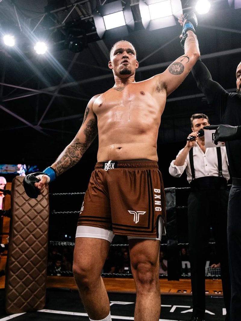 A referee raises Jansey&rsquo;s hand in victory in the ring after a Dirty Boxing Championship bout.